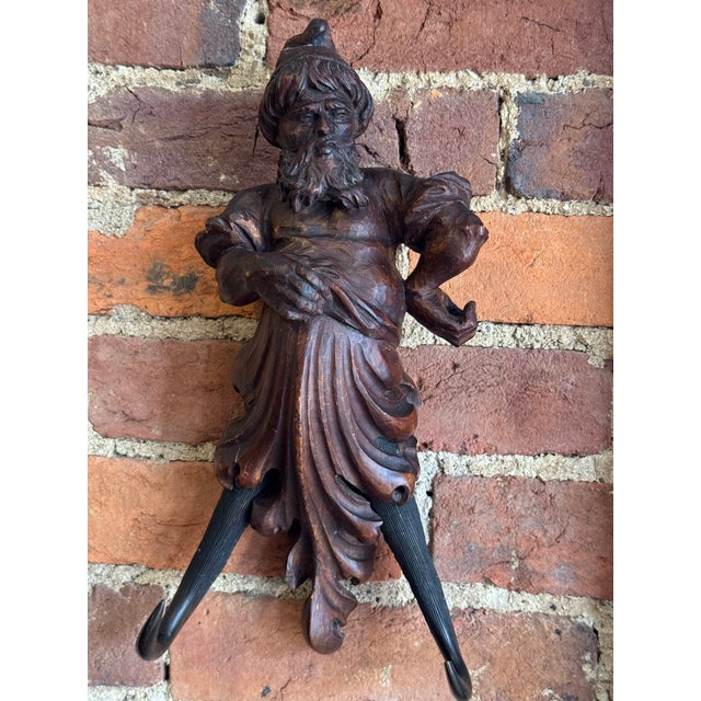This is an antique Alpine work of art! 19th century Black Forest style wall mounted riding crop holder. From either...
