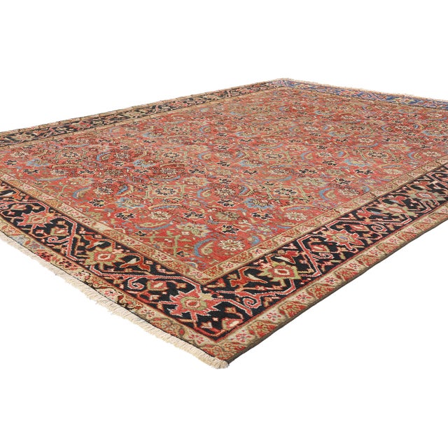 90005 Antique Persian Heriz Rug, 08'00 x 09'09. This captivating hand-knotted wool antique Persian Heriz rug is a...
