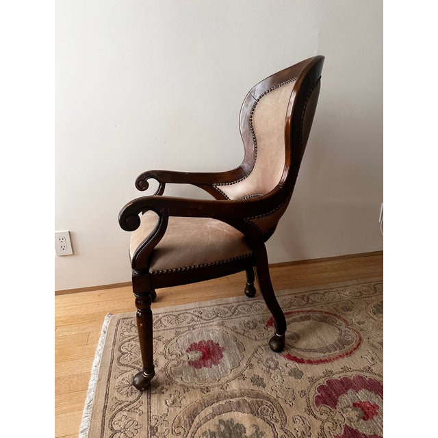 Beautiful taupe leather and wood desk chair Nailhead trim front and back.Fine reproduction some slight scratches