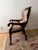 Beautiful taupe leather and wood desk chair Nailhead trim front and back.Fine reproduction some slight scratches