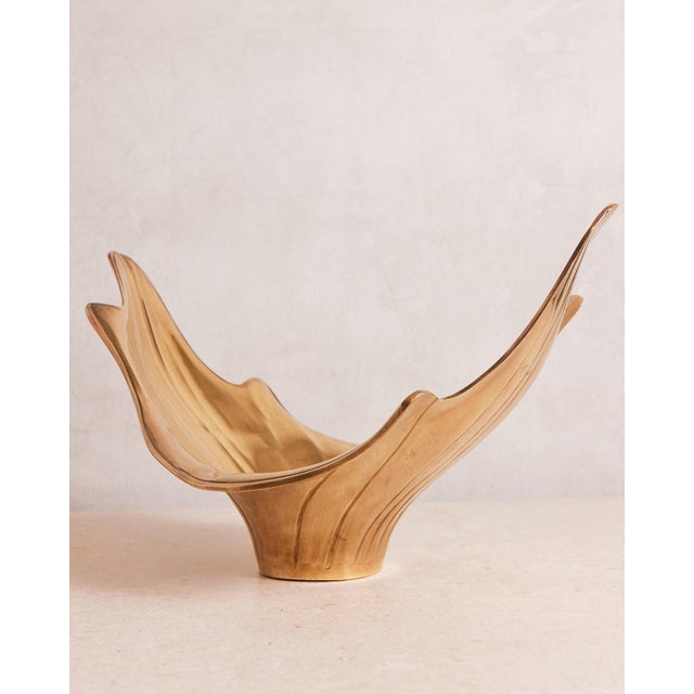 This large low sculptural bowl is beautiful as a shelf styler, coffee table styler, catchall, or a dramatic shallow vase...