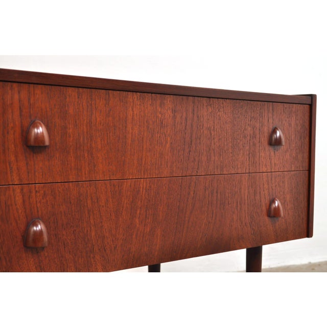 1950s, denmark. Beautiful, striking handles and lovely legs. Can also be used as a tv stand! dimensions: w83 cm x d39 cm x...