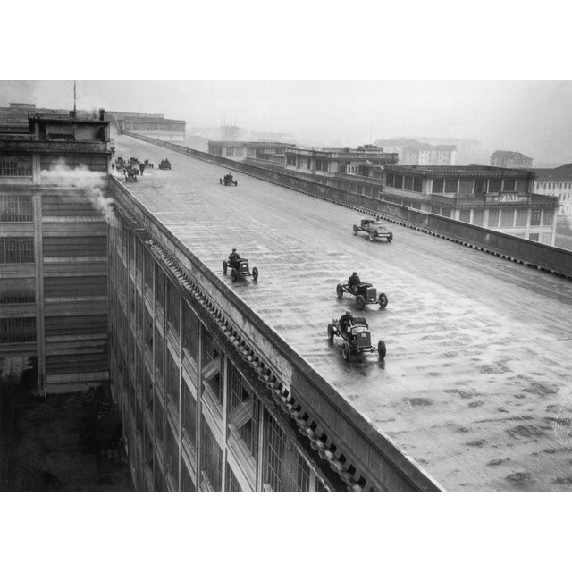 Rooftop Racing Cars racing around the oval track on the rooftop of the Fiat works in Turin, Northern Italy, built for...