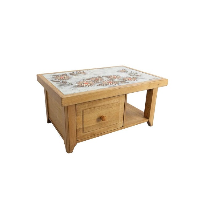 This solid oak table, with its substantial build, is reminiscent of the style of Guillerme and Chambron tables. It is...