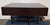 Bespoke coffee table produced by local LA furniture company featuring a wood table top and blackened steel legs. Used...