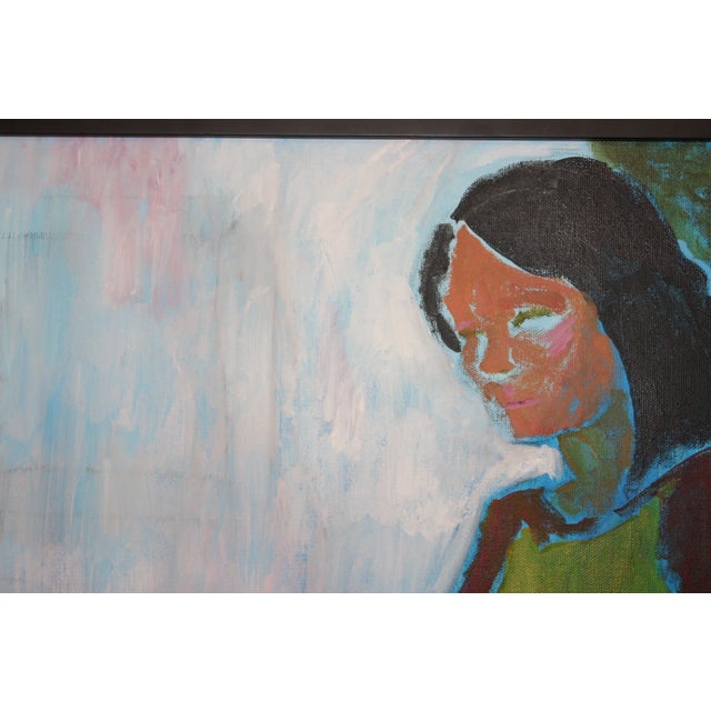 Contemporary abstract oil painting of a woman in shades of blue, green, deep red, and violet. Housed in a black wood frame...