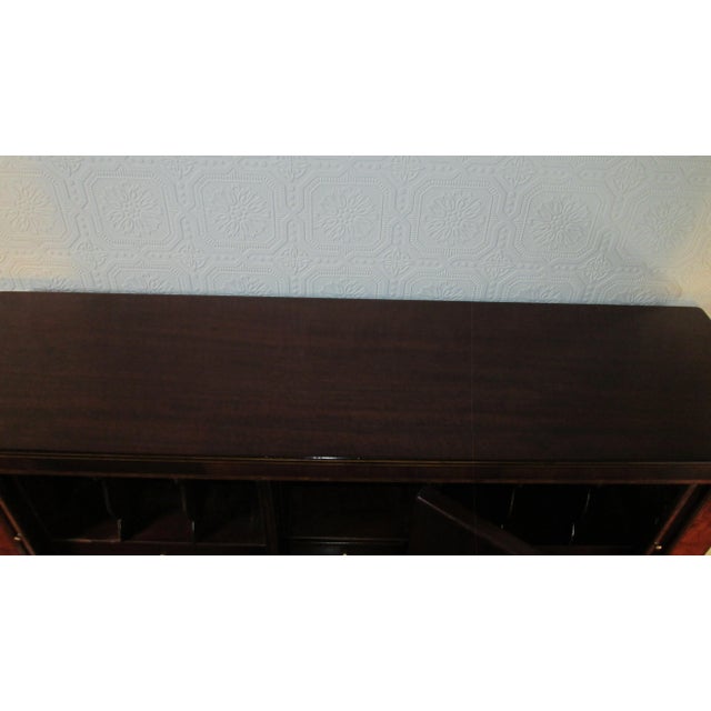 This is beautiful Tambour desk made by Beacon Hill of Boston this model is the "Applegate" . The desk is made of mahogany...