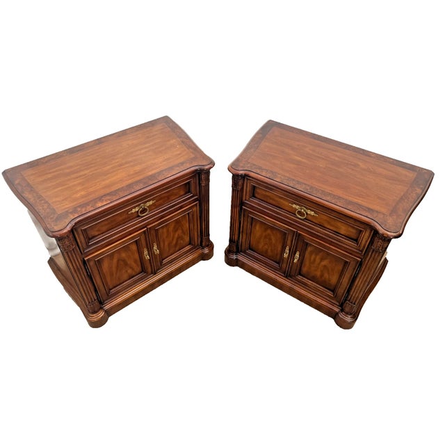 Elevate your bedroom with this exquisite matching pair of vintage nightstands from Drexel Heritage esteemed "Laureate"...