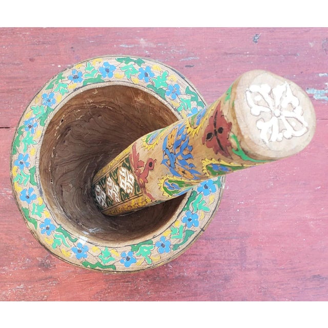 Amazing mortar and pestle made in Morocco from aged wood, for display and decoration purposes only. This beautiful accent...