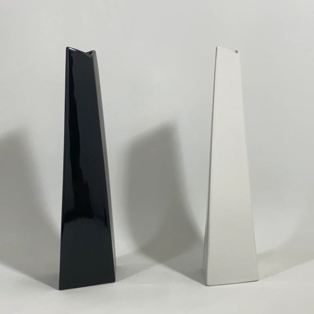 Vintage circa 1980s/1990s ceramic pair of vases Produced by Studio Nova as a white and black complimentary pair Postmodern...