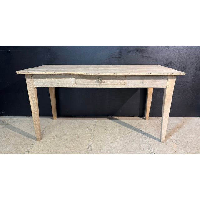 A lovely 19th Century French Country Normandy Table, made from Oak and having a great original colour and patina. Single...