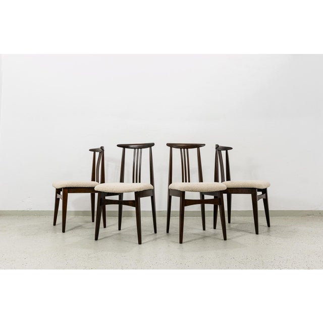 A set of four chairs, model 200/100B, designed by Mieczysław Zieliński, manufactured in Poland in the 1960s. The chairs...