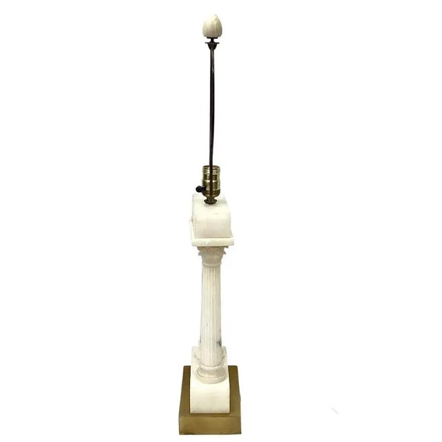 Early 20th century Italian alabaster lamp with two Roman marble columns. Lamp rests on gold square metal base. Original...