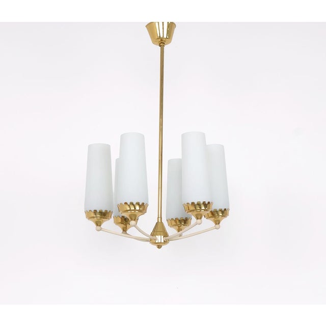 Vintage 6-arm chandelier, sweden, 1950s chandelier crafted in brass with six separate cylindrical frosted glass shades....