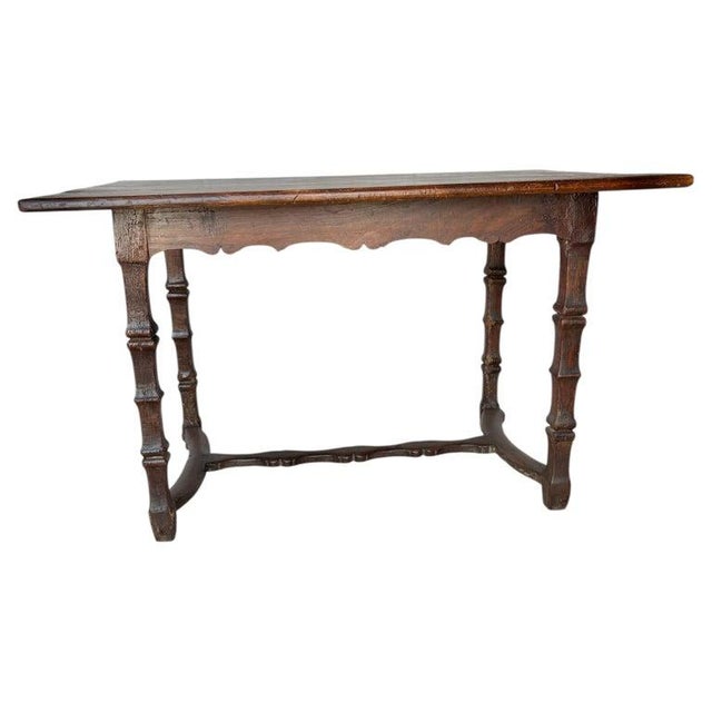 Found in the South of France, this 19th Century French Pine Trestle Side Table dates back to the late 1800's. The piece...