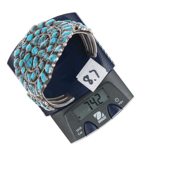 6.5" 60's-70's Native American Sterling turquoise cluster cuff bracelet. Nice solid cuff with no issues, nice quality...