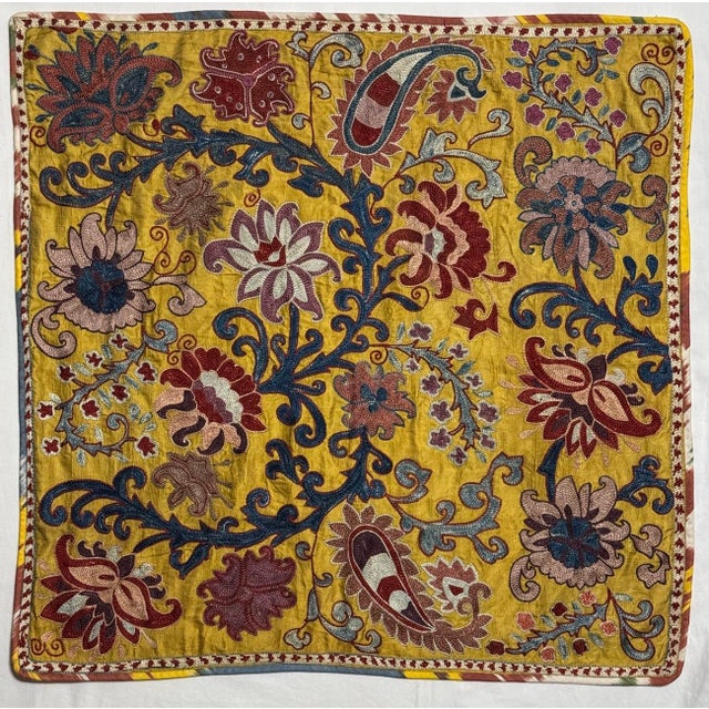27” square Suzani hand embroidered textile from Uzbekistan. Very detailed floral and paisley pattern embroidered on a...