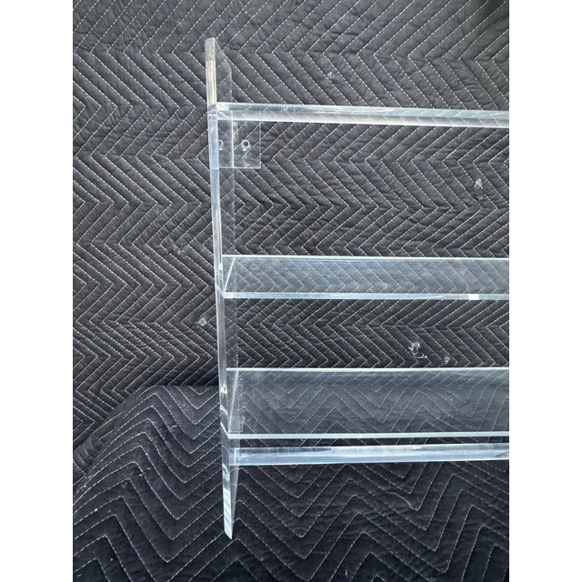 Elevate your bathroom (or vanity, kitchen, or display space) with this stunning vintage **lucite etagere** from the mid-...