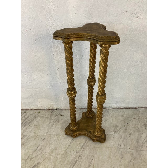 Lovely dark gold pedestal, made of wood and nicely detailed, this piece is perfect to highlight a favorite sculpture or bust.