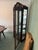 Elegant Pulaski illuminated curio cabinet in excellent condition, showcasing classic traditional design and refined...