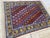 This vintage rug is hand-knotted in wool, woven in the Shirvan Caucasian tribal design tradition. Measuring 5'1" x 6'7"...