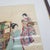 Vintage Japanese Ukiyo-E Period Woodblock Print Depicting Two Women With Scroll and Book For Sale - Image 4 of 15