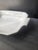 This deep, heavyweight casserole serving dish can move directly from oven to table. In excellent condition. Stamped on the...