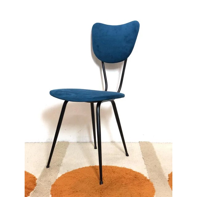 60s chair patented model made in Italy. The chair is made with a metal structure painted in opaque black, the seat and...