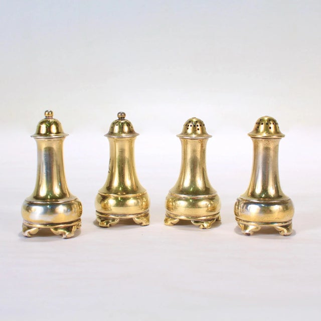 A very fine set of 4 antique gilt sterling silver salt & pepper shakers. By Tiffany & Co. Each shaker is engraved to the...