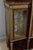 Louis xvi style serving display case with three doors and shelves. This piece of furniture is very carefully crafted and...