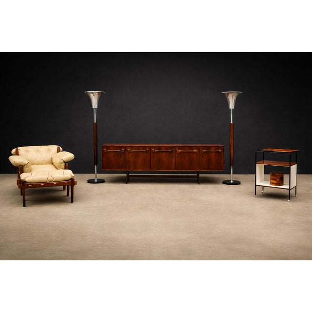 Produced in the 1960s by Novo Rumo, this Brazilian Modern credenza is distinguished by its sculptural bow-shaped detailing...
