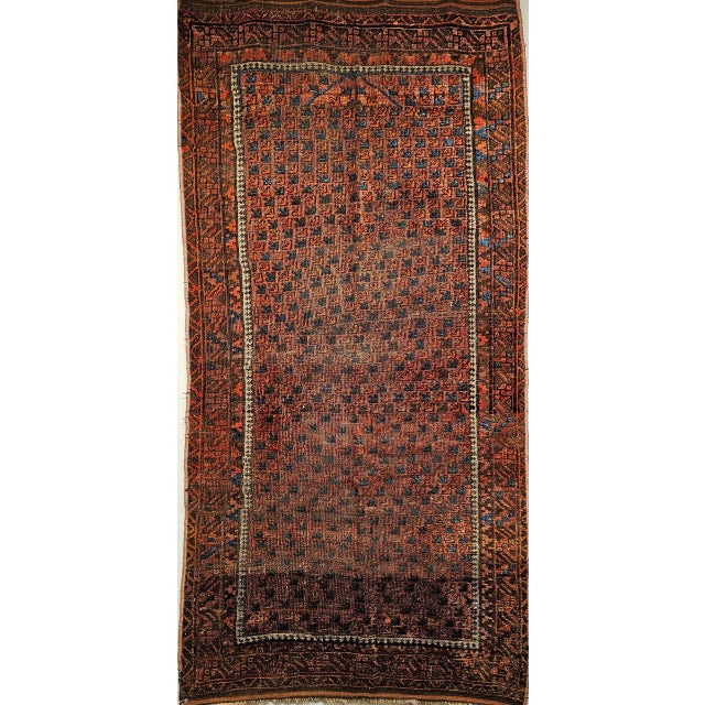 An exceptional example of 19th-century Central Asian textile art, this authentic Turkmen Yomut area rug showcases the...
