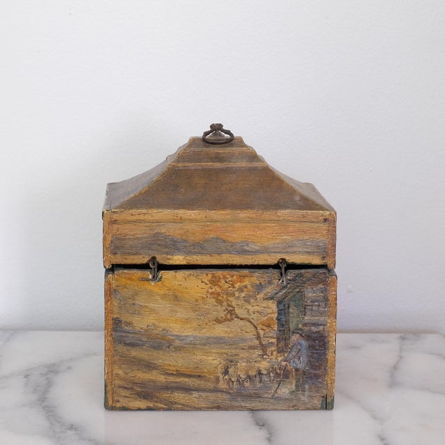 Beautiful wooden box, with different hand-painted scenes on each side. This is a very unique piece! The hinges along the...