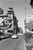 The black-and-white photo depicts a street scene from San Francisco's Chinatown along Grant Avenue, taken in 1962. The...