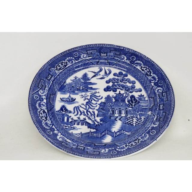 This gorgeous plate is stamped on the bottom E.B & J.E.L England. This beautiful 19th century blue willow plate is...