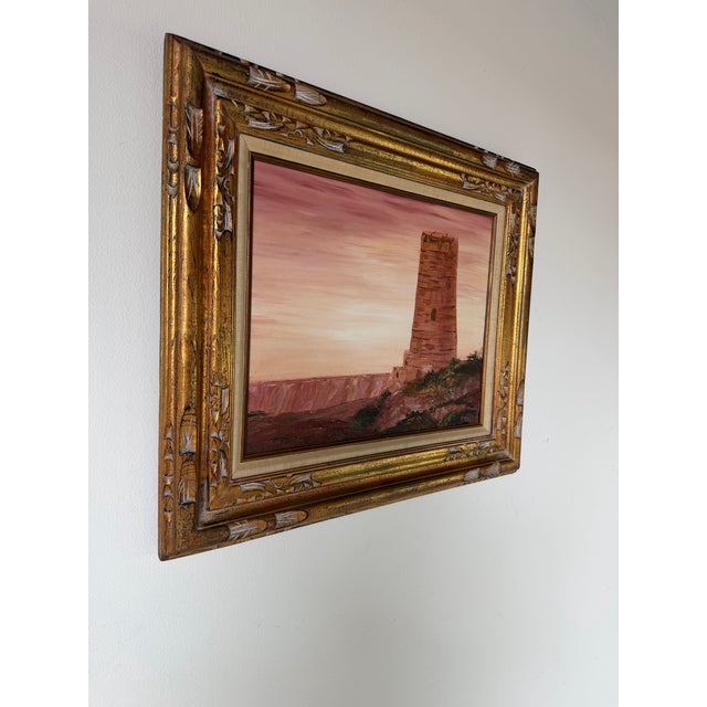 A striking 1975 oil on canvas landscape painting by T. Cook depicting the iconic Desert View Watchtower overlooking the...