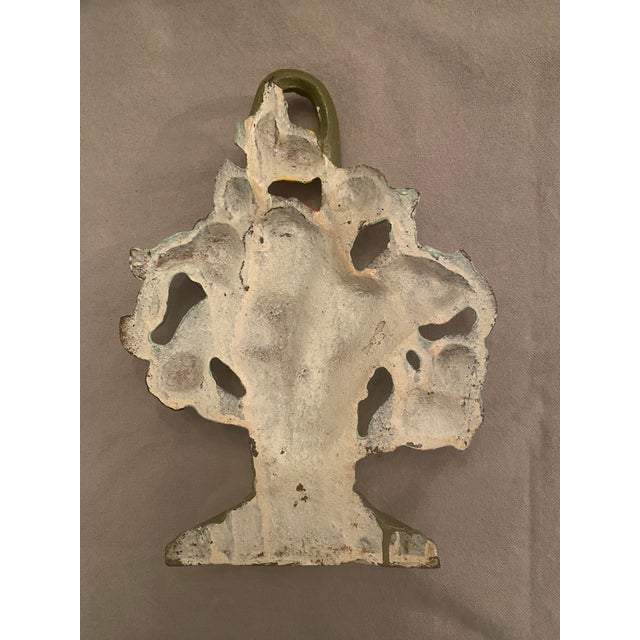 1930's Cast Iron Hubley Doorstop. Floral Basket Moss green Basket with red yellow and pink flowers. Beautiful Patina....