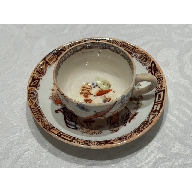 Step directly into the artistic fervor of late-19th-century British Aestheticism with this museum-quality miniature tea...