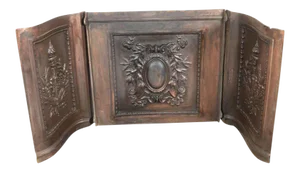American Bronze-Plated Iron Fireback with Crest, Torch and Foliate Motifs
