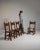 Rendered in richly grained French oak, this striking set of four dining chairs exemplifies the Brutalist aesthetic that...
