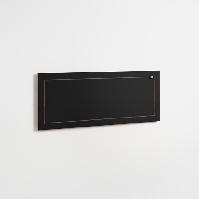Fifteen folders standing upright or more than two opened folders lying, is what you can expect from a wall board that...