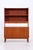 Vintage shelving unit with chest of drawers and hutch made of teak. The upper section offers three open compartments and...