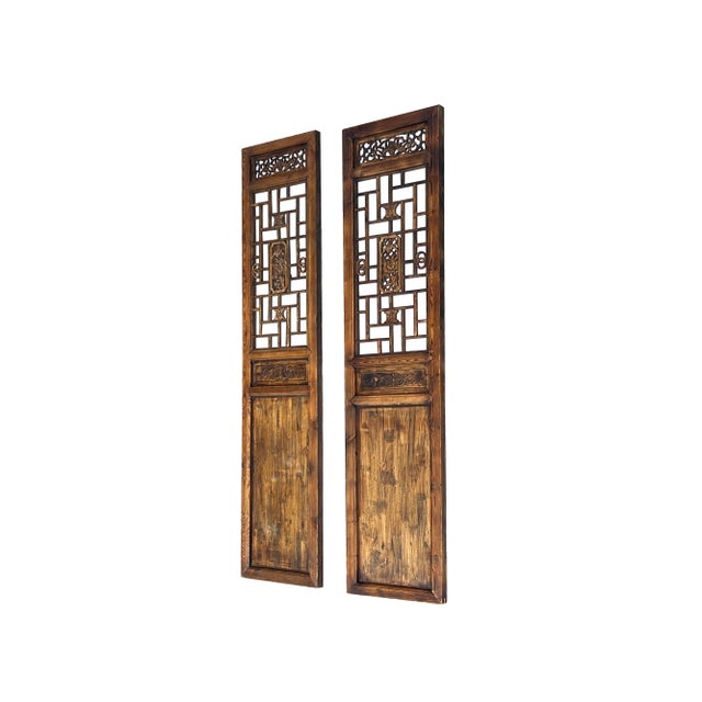 Immerse your space in the timeless elegance of these Pair Vintage Chinese Tall Flower Bird Geometric Pattern Raw Wood Door...