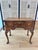 A fantastic 18th century Queen Anne/Georgian burled wood lowboy/dressing table featuring beautiful cabriole legs with...