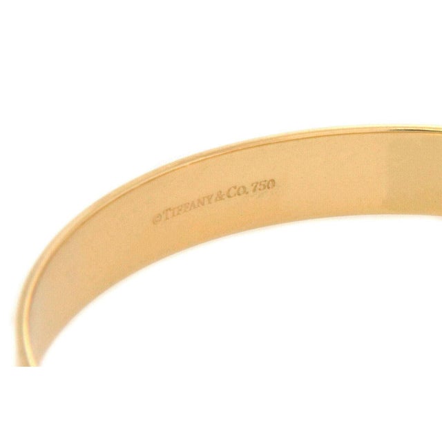 Tiffany and Co. Tiffany & Co. 18k Yellow Gold Keyhole Lock Bangle Bracelet For Sale - Image 4 of 4