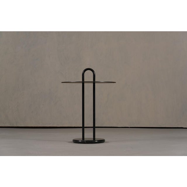 A rare vintage Italian coffee table designed by Vico Magistretti for Cattelan Italia in the 1980's. This small, round...