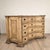 A large scale Baroque painted chest of drawers made in Denmark circa 1750 in the Italian style. This commode is a bold...
