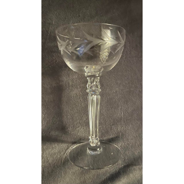 A refined set of six vintage champagne coupes by Fostoria Glass Company, featuring the elegant 6030 stem with fluted...