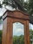 English Antique Tramp Art Style Solid Wood Armoire With Mirror | Hand-Carved Wardrobe Cabinet For Sale - Image 3 of 11