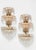 They operate with 5 small E14 screw-in light bulbs. Two in the lower and middle trays and one in the upper tray. European...